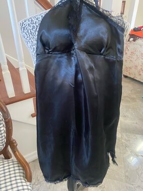 Gorgeous black slip.   Can be worn as a slip or short gown size s/m